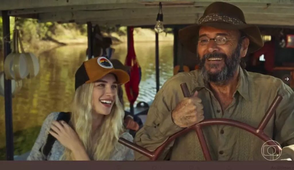 Chegada de Érica (Marcela Fetter) ao Pantanal foi batendo papo com Eugênio (Almir Sater) - (Fotos: TV Globo, Reprodução)